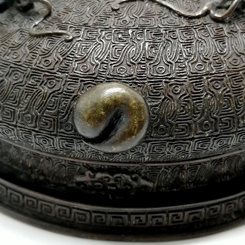 141 - Oriental antique bronze censer profusely decorated with character marks to base & terminating on 4 s... 