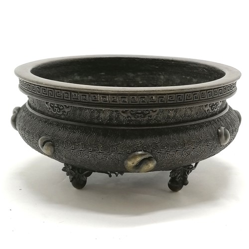 141 - Oriental antique bronze censer profusely decorated with character marks to base & terminating on 4 s... 