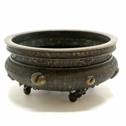 141 - Oriental antique bronze censer profusely decorated with character marks to base & terminating on 4 s... 