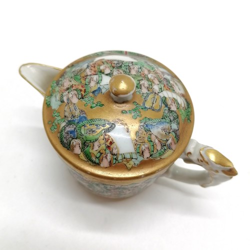 146 - Oriental small teapot with dragon handle & profuse decoration and with inner grill - 8cm high and ha... 