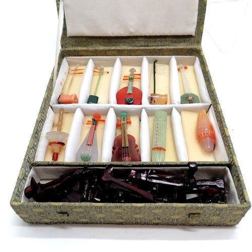 149 - Boxed set of 10 x hardstone musical instruments with stands - box 24cm x 28cm with no obvious damage