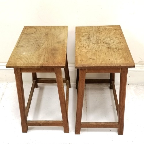 178 - Pair of oak Cotswold school style tables with stretcher base - obvious marks to top & slight shrinka... 