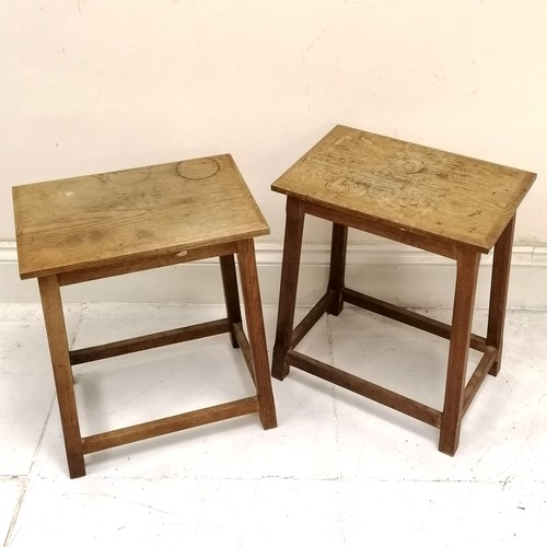 178 - Pair of oak Cotswold school style tables with stretcher base - obvious marks to top & slight shrinka... 