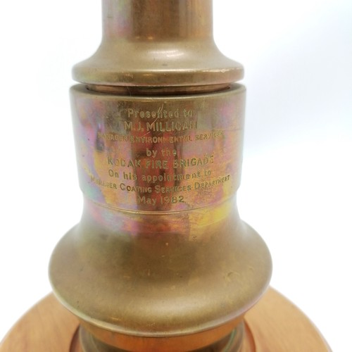 198 - H N Morris & Sons Ltd fire hose nozzle on turned wooden base with 1982 dedication - 34.5cm high