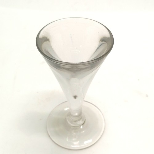 204 - Antique toastmasters glass with flared bowl - 12.5cm high x 7cm diameter to base which has polished ... 