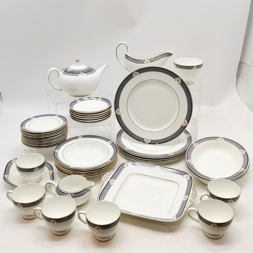 211 - Qty of Wedgwood Waverley bone china to include teapot, plates, gravy boat, etc - all in used conditi... 