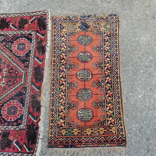 252 - 2 x antique Eastern rugs - largest 107cm x 150cm ~ both a/f