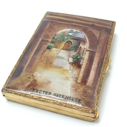 306 - Indian wooden box containing Exeter Gatehouse enamel compact mirror (8cm x 5.5cm), 3 painted lead ki... 