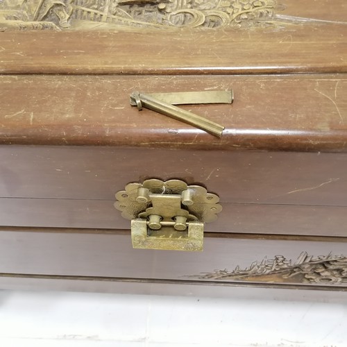 325 - Oriental camphor chest with carved detail terminating on 4 feet - 94cm x 46cm x 53cm high ~ has obvi... 