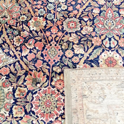 329 - Large wool floral patterned carpet 406cm x 318cm - slight moth damage but otherwise in good used con... 