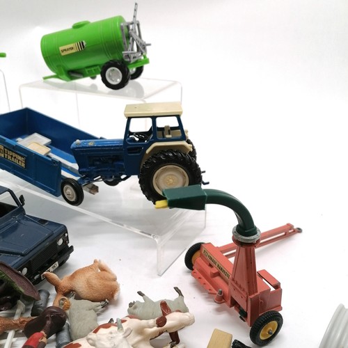 334 - Vintage plastic farm toys lot in die cast tractor + trailer, Britains etc