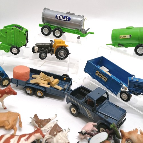 334 - Vintage plastic farm toys lot in die cast tractor + trailer, Britains etc