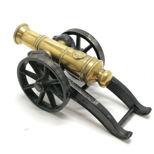 350 - Antique model brass cannon on a steel limber with Royal cypher to the barrel (24cm) - total length 3... 