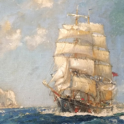 374 - Frank Henry Mason (1875-1965) signed oil painting on canvas of a sailing ship near to shore with a l... 