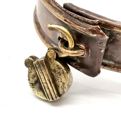 376 - Antique brass dogs collar with original padlocked clasp - 8cm diameter and has dents + inscription '... 