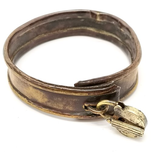 376 - Antique brass dogs collar with original padlocked clasp - 8cm diameter and has dents + inscription '... 