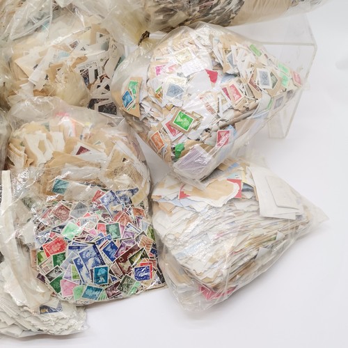 410 - Large qty of mostly GB stamps (on / off paper) in kiloware bags / loose inc regional ~ approx 15kgs+