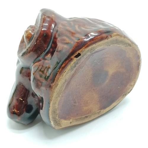 489 - Antique stoneware treacle glaze rams head moneybox - 7cm high ~ graze to 1 horn otherwise no obvious... 