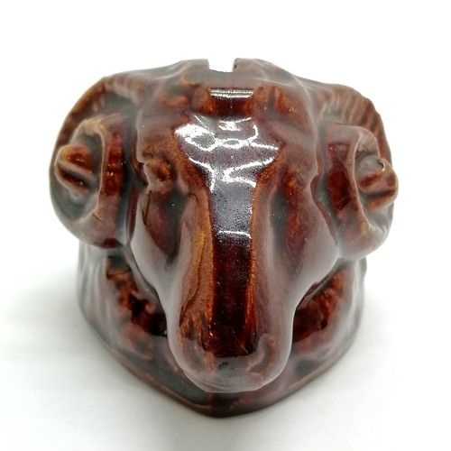 489 - Antique stoneware treacle glaze rams head moneybox - 7cm high ~ graze to 1 horn otherwise no obvious... 