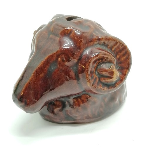 489 - Antique stoneware treacle glaze rams head moneybox - 7cm high ~ graze to 1 horn otherwise no obvious... 