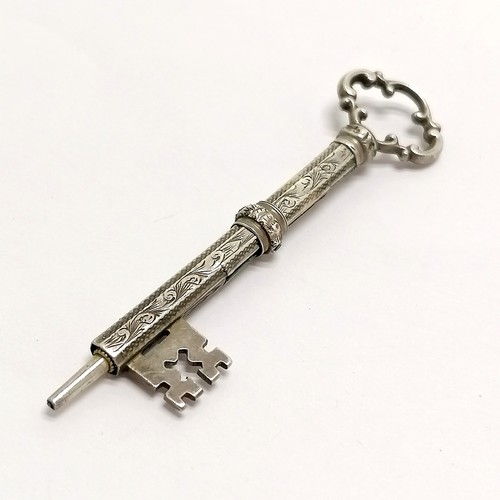 493 - Novelty antique unmarked silver propelling pencil in the form of a key - 6.6cm and is slight a/f to ... 