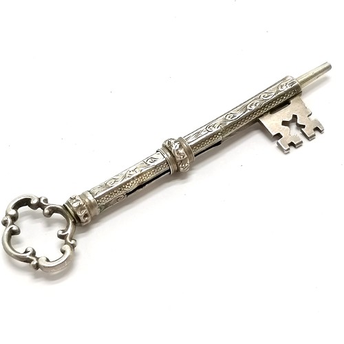 493 - Novelty antique unmarked silver propelling pencil in the form of a key - 6.6cm and is slight a/f to ... 