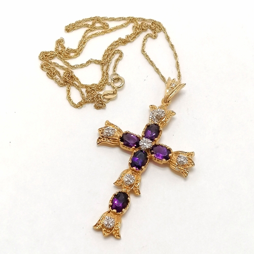 415 - 14ct marked gold cross set with amethysts & diamonds (5cm drop) on a 14ct marked gold 44cm chain ~ t... 