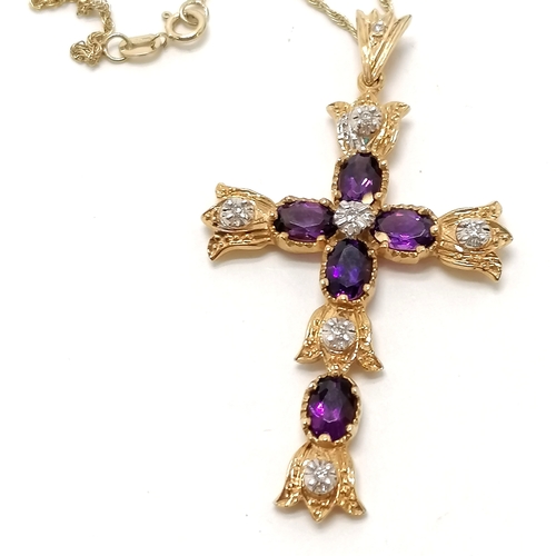 415 - 14ct marked gold cross set with amethysts & diamonds (5cm drop) on a 14ct marked gold 44cm chain ~ t... 