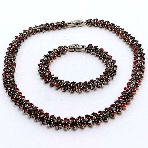 443 - Silver matching necklace (40cm) & bracelet (18cm) set with garnets & marcasite ~ total weight (2) 95... 