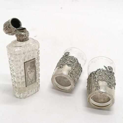 720 - Pair of 800 silver marked drinks tots with etched glass liners - 5.5cm high ~ 1 has tiny chip to top... 