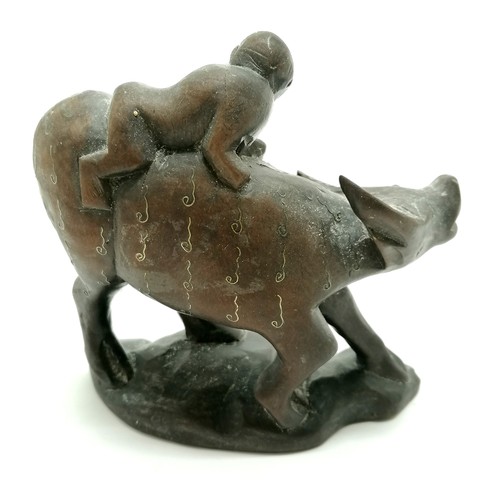 15 - Antique Chinese carved wooden figure of a boy on the back of a water buffalo with silver wire inlay ... 
