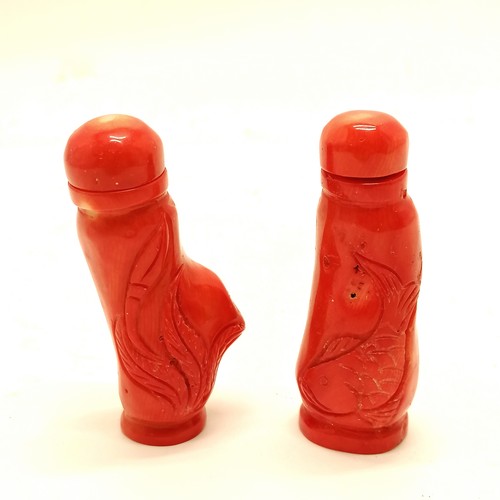 21 - Pair of hand carved coral Oriental snuff bottles (7.5cm) with aquatic detail - 1 slight a/f