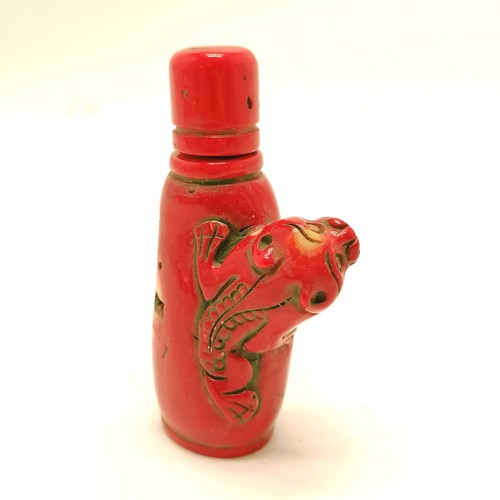 22 - Oriental hand carved coral snuff bottle with animal carving detail - 9.5cm high