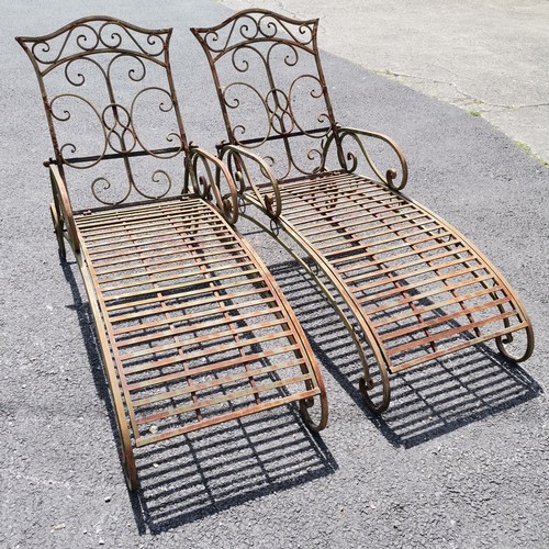 37 - Pair of tubular steel adjustable sun loungers - 145cm long x 88cm high x 56cm wide with some surface... 