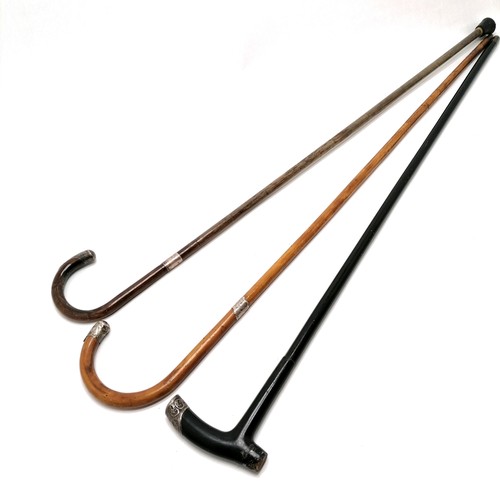 45 - 3 x antique walking sticks all with silver mounts - 89cm ebonised stick lacks 1 mount