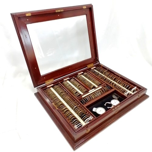 48 - Antique opticians mahogany cased (with bevelled glass) set of eye test lenses with other tools ~ 56c... 