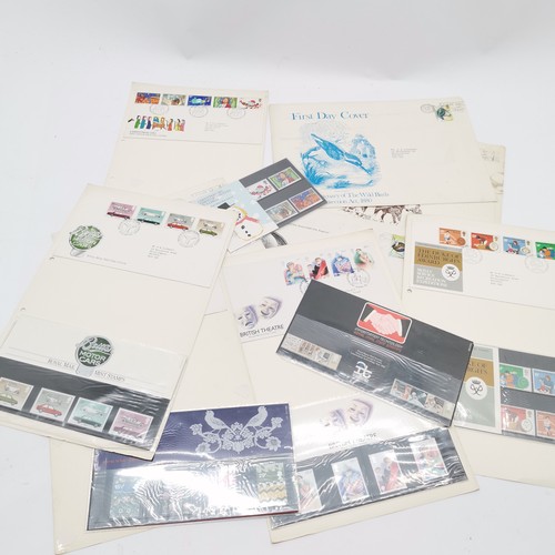 65 - Qty of stamps in 4 albums - mostly 1970's/80's presentation packs, FDC's & PHQ cards