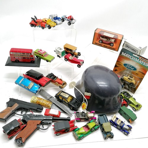 100 - Qty of toy cars inc boxed Matchbox t/w toy Luger cap gun & German helmet