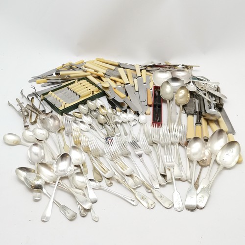 141 - Large quantity of cutlery including sugar tongs, jam spoons, carving set, salad servers etc some box... 