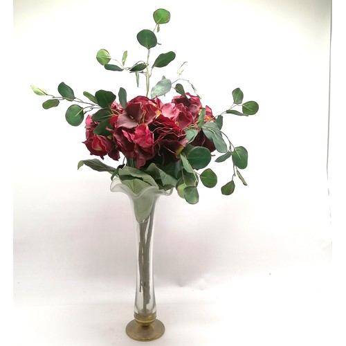 143 - Large glass vase with bronze base with a display of silk flowers total height 90cm