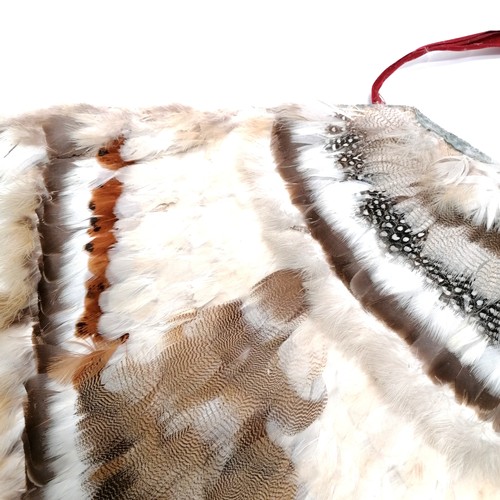 148 - Antique native American Indian feather cloak with red felt lining and pale blue cotton binding to th... 