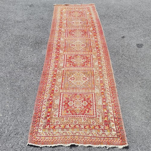 166 - Antique orange grounded hand woven wool Turkish Milas rug / runner with geometric pattern and centra... 