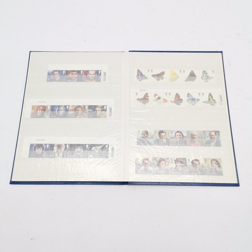 229 - Blue stockbook with UM/M (MNH) collection of GB 250 x 1st class stamps in blocks / strips FV £337.50