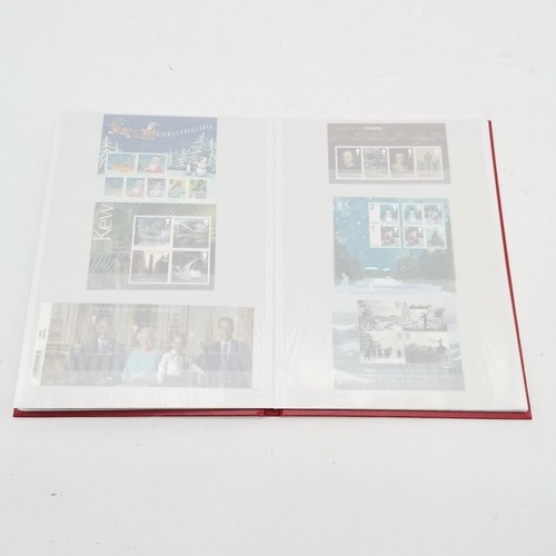 231 - Red stockbook with mint collection of 49 x GB miniature sheets FV £230+