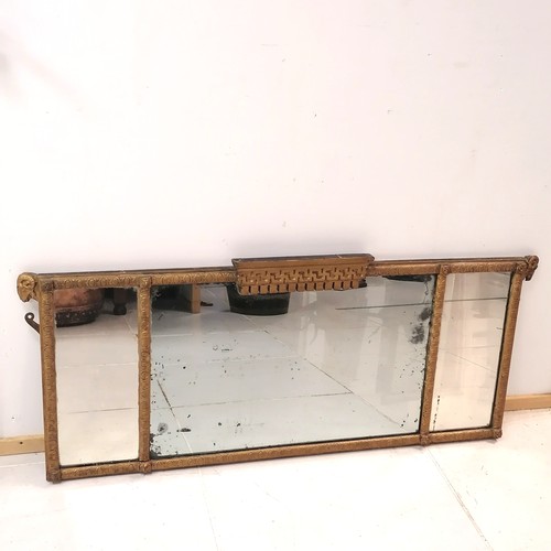 307 - Antique triple mirrored over mantle in a gilt frame with rams head detail 130cm x 55cm high - some d... 