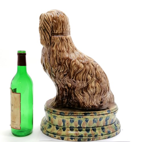 2 - Large Scottish pottery dog / spaniel treacle glaze figure on a spongeware decorated base 44cm high -... 