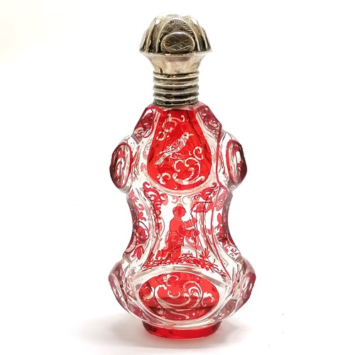 90 - Antique deep cut glass scent bottle with red oriental detail of man & a bird & continental silver ma... 