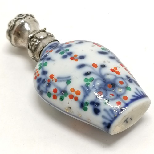 92 - Antique continental marked silver topped scent bottle with porcelain floral decorated body - 8cm & n... 