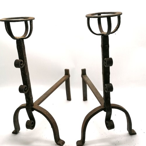 105 - Pair of wrought iron firedogs / andirons with basket mounts at top - 56cm high t/w pair of tongs & p... 