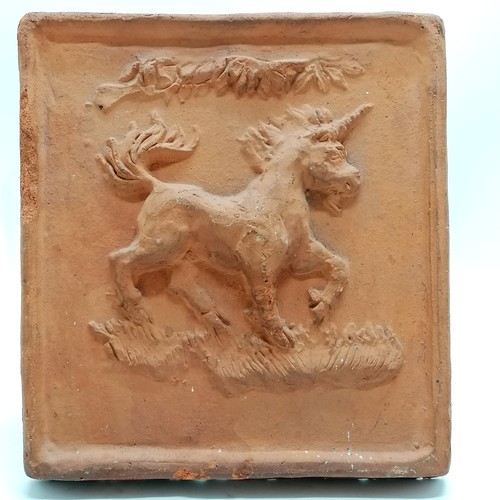 125 - Artland (?) terracotta tile depicting a unicorn - 21.5cm x 23.5cm ~ slight frittering